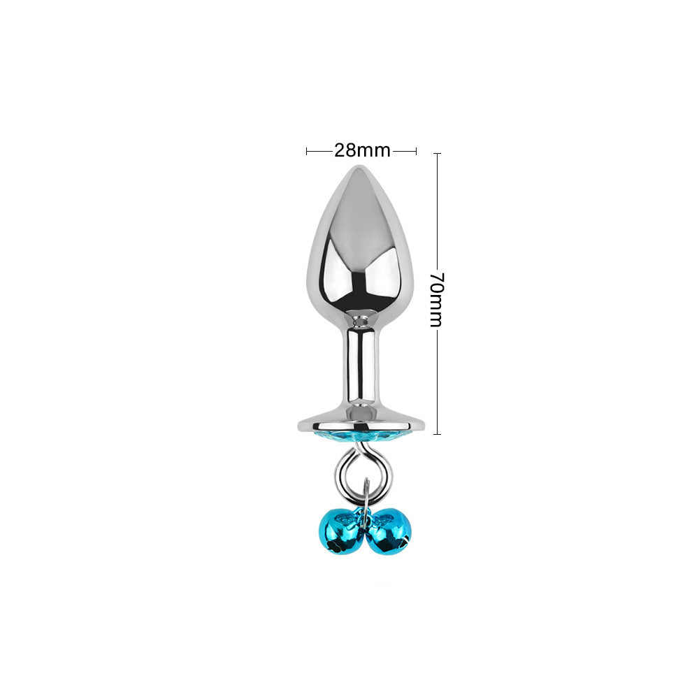 Tapón anal con joyas azules, cascabeles y correa