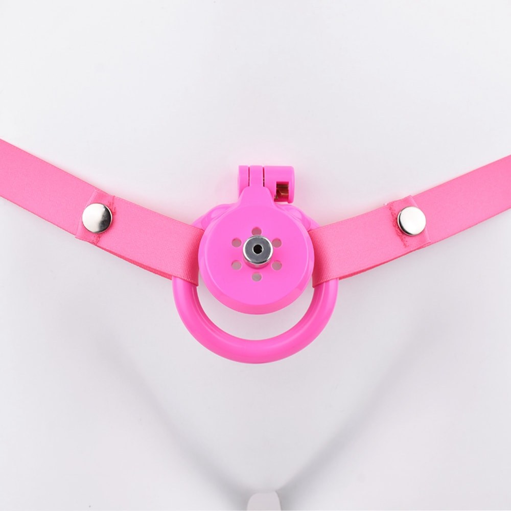 "Durable pink chastity cage crafted for sissy training and long-term comfort."