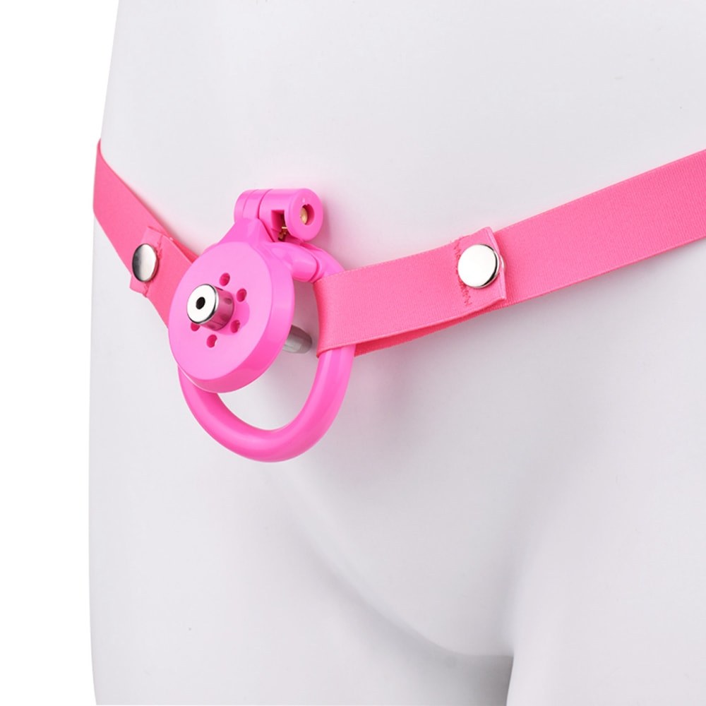 "Elegant pink chastity cage designed for secure long-term chastity and sissy training."