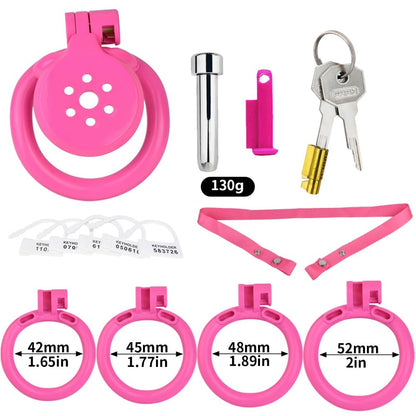 "Compact pink chastity cage designed for chastity bondage and permanent chastity wear."