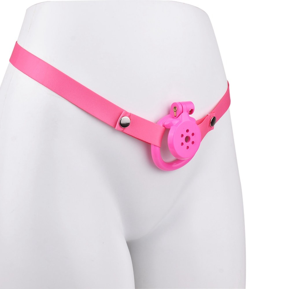 "Stylish pink chastity cage offering security for chastity couple dynamics."