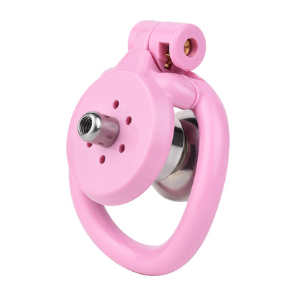 "A vibrant pink chastity cage, sleek flat chastity cage, and innovative inverted chastity cage displayed together for diverse styles."