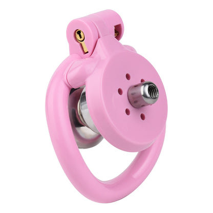 "Close-up of a flat chastity cage and pink chastity cage, showcasing ergonomic designs for long-term comfort."