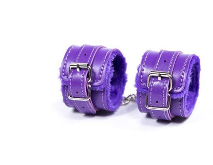 Purple fur-lined BDSM handcuffs with chain