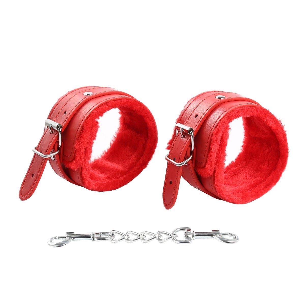 Red fur-lined BDSM handcuffs with chain