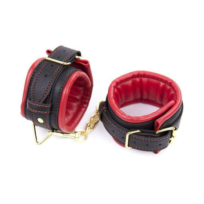 Red and black padded BDSM handcuffs with gold chain