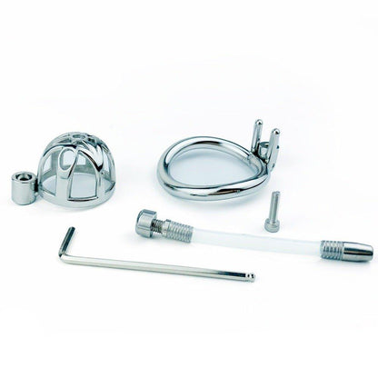 Disassembled steel chastity cage with catheter and tools