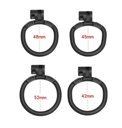 Four black chastity rings with sizes 48mm to 42mm