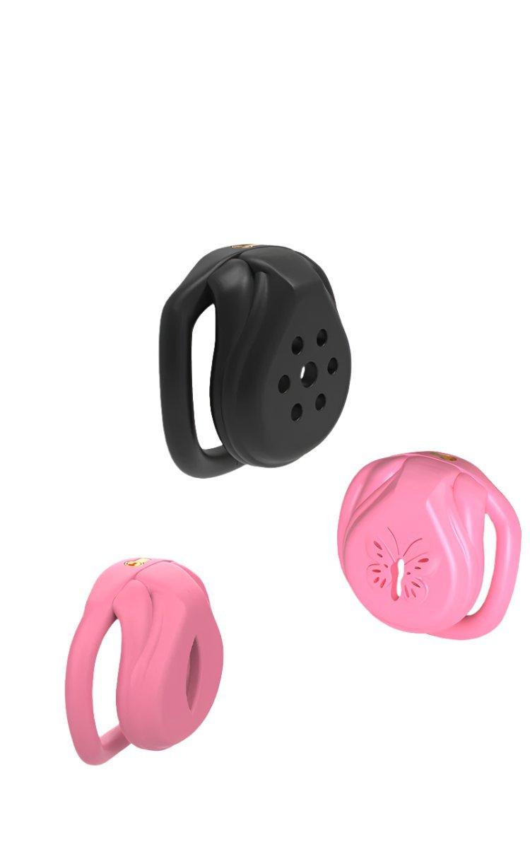 Pink and black chastity cages with various designs