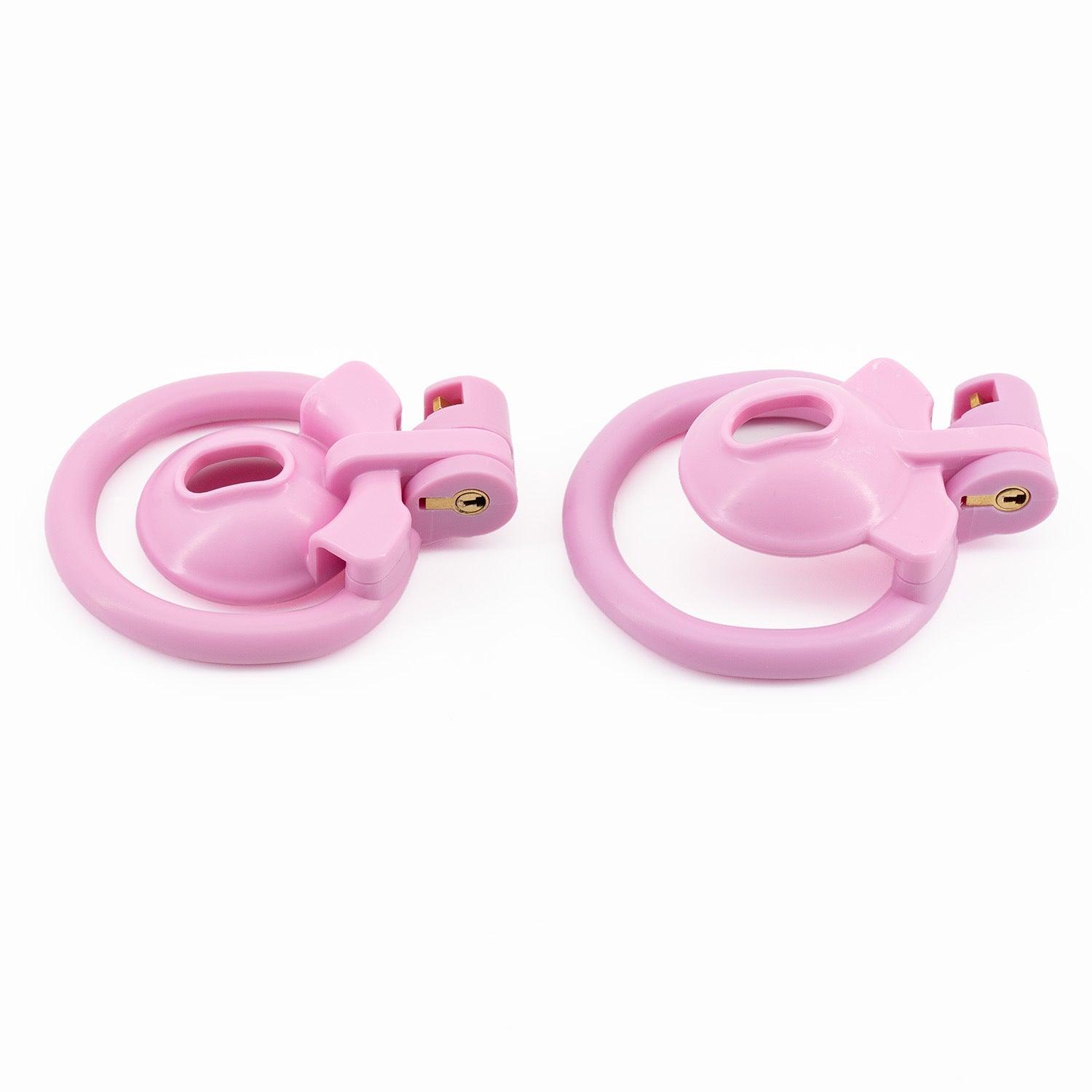 a pair of pink rings on a white background