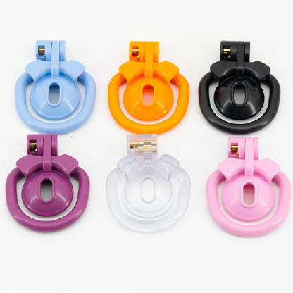 a group of four different colored plastic objects