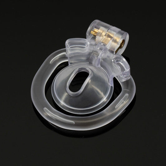 a pair of clear ear plugs on a black surface