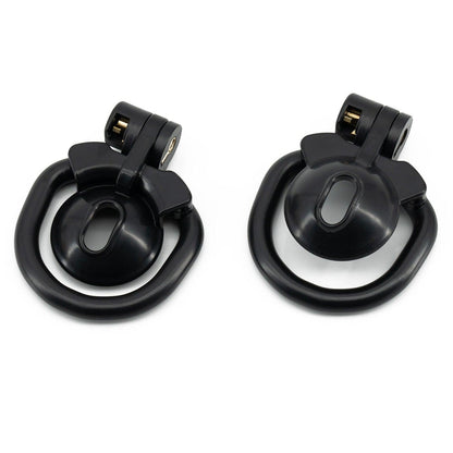 a pair of black ear clips on a white background