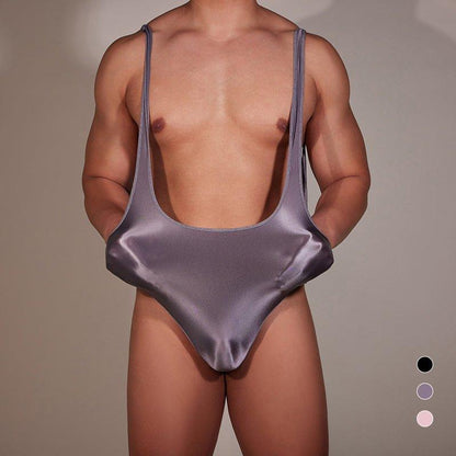 men's silky bodysuits, leotards, sissy singlets, and jumpsuits reveals a diverse array of lingerie, dancewear, roleplay costumes, and fashion-forward one-pieces, ranging from sensual satin and spandex to frilly, lace-adorned designs, catering to various preferences in intimate wear, performance attire, cross-dressing, and contemporary streetwear