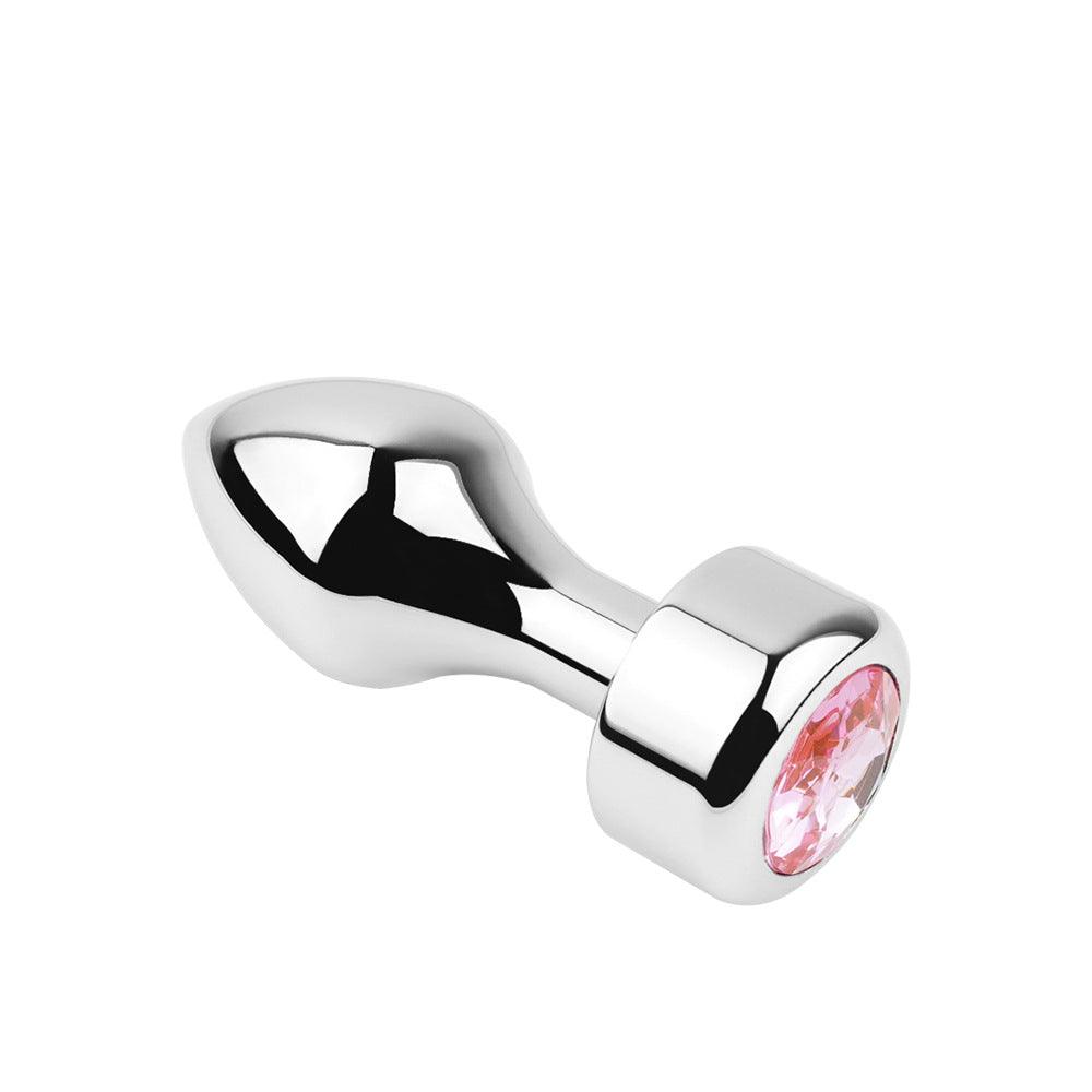 Metal butt plug with pink gem and bullet head