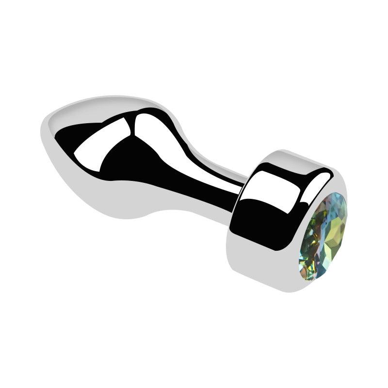 Metal butt plug with green gem and bullet head