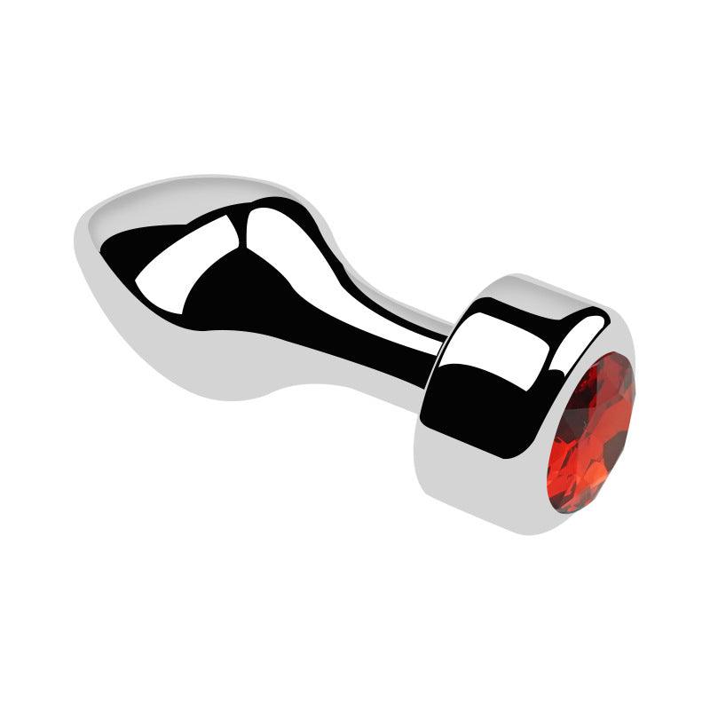 Metal butt plug with red gem and bullet head