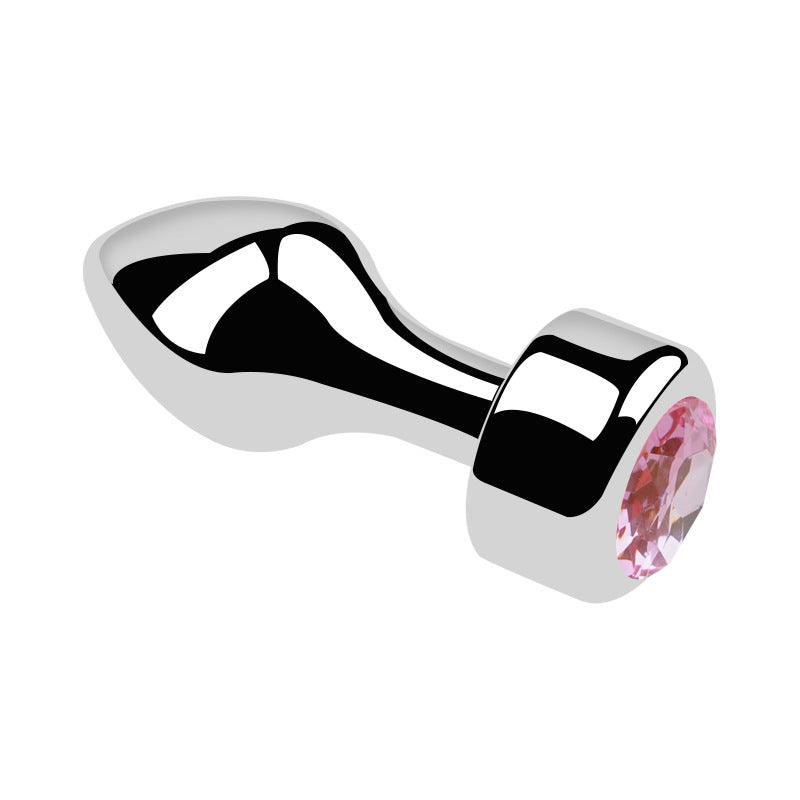 Metal butt plug with pink gem and bullet head