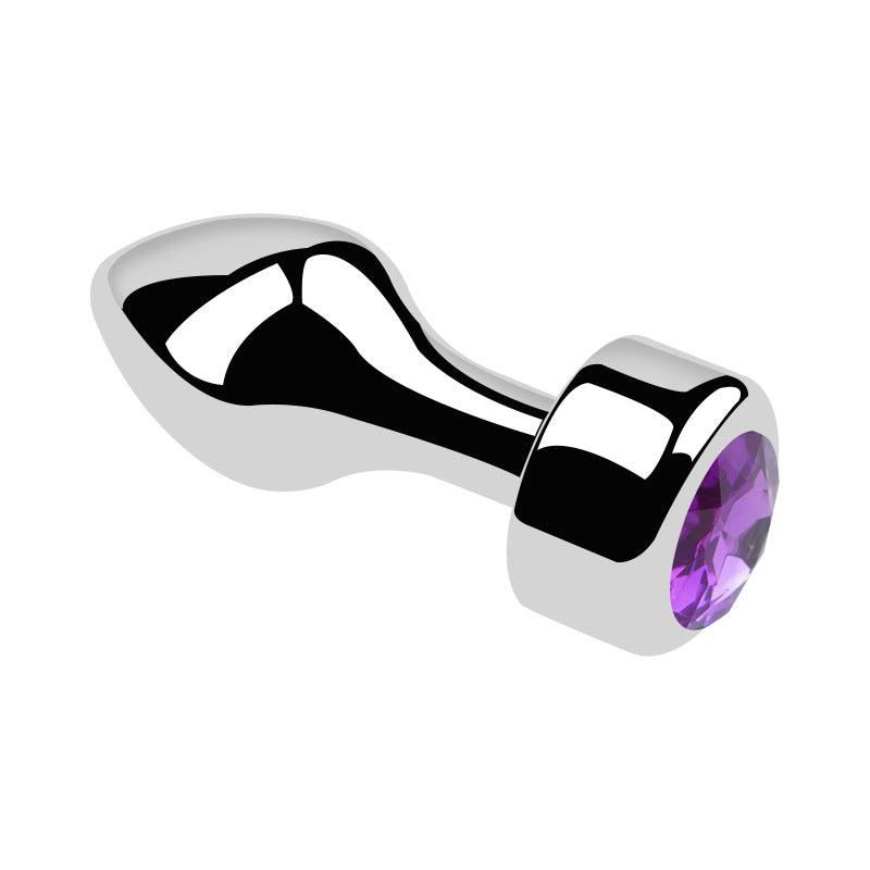 Metal butt plug with purple gem and bullet head