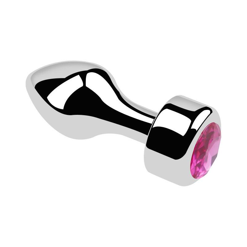 Metal butt plug with pink gem and bullet head