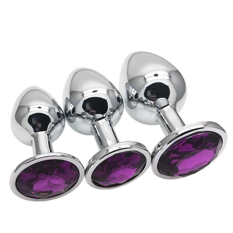 Metal butt plug kit with purple gems, sizes S, M, L