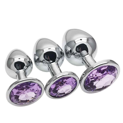 Metal butt plug kit with light purple gems, sizes S, M, L