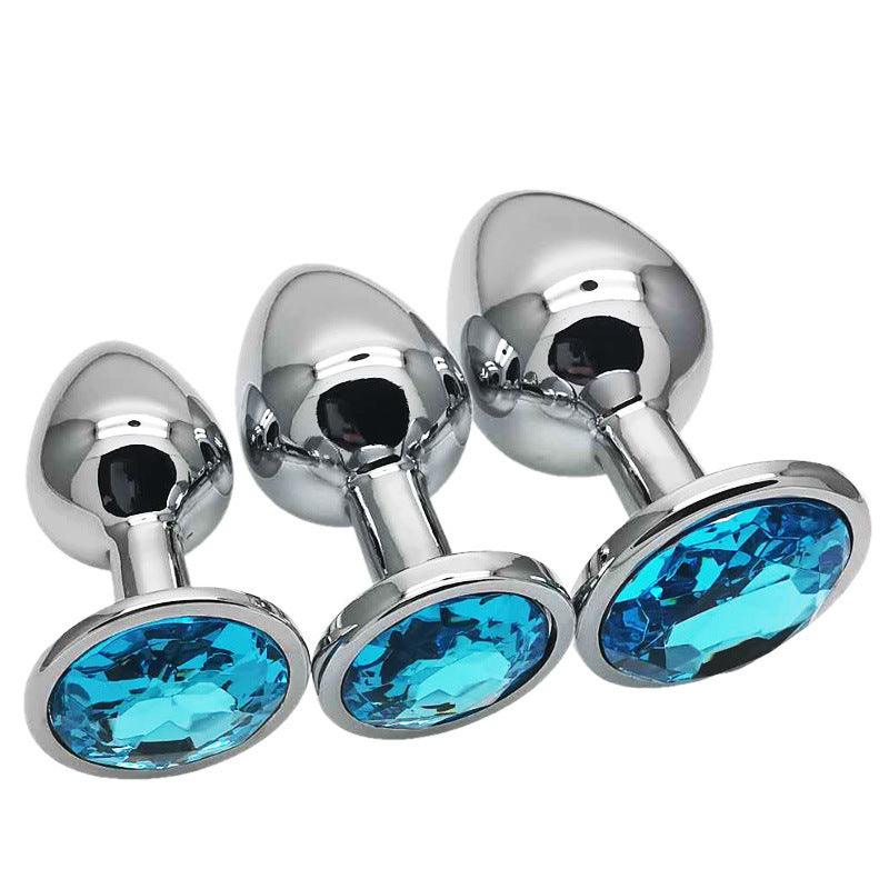 Metal butt plug kit with turquoise gems, sizes S, M, L