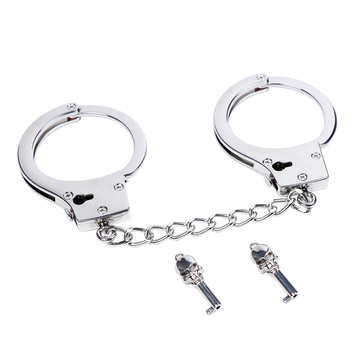 Silver metal handcuffs with safety release