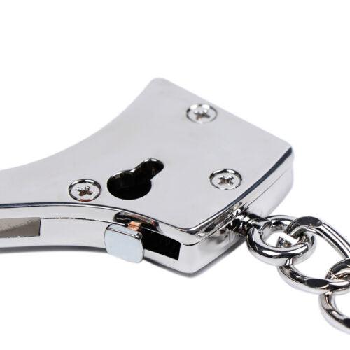 Silver handcuff lock with keyhole detail