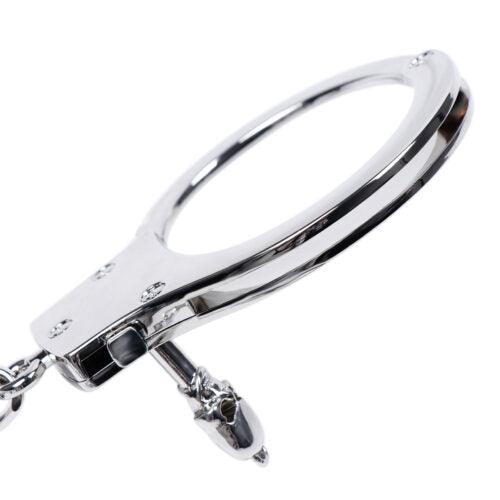 Silver handcuff with safety release key