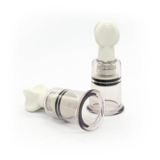 Pair of silicone nipple suckers with white handles