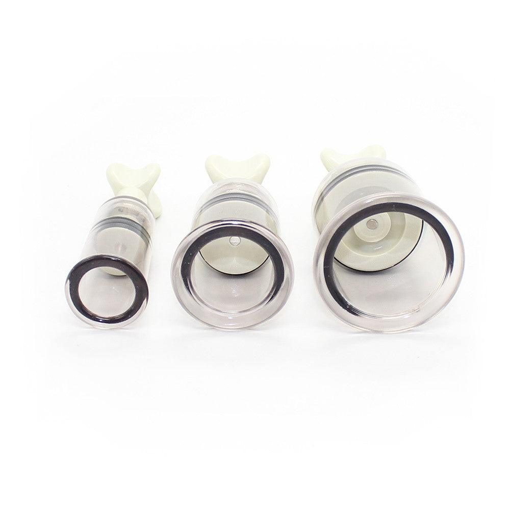 Three silicone nipple suckers in varying sizes