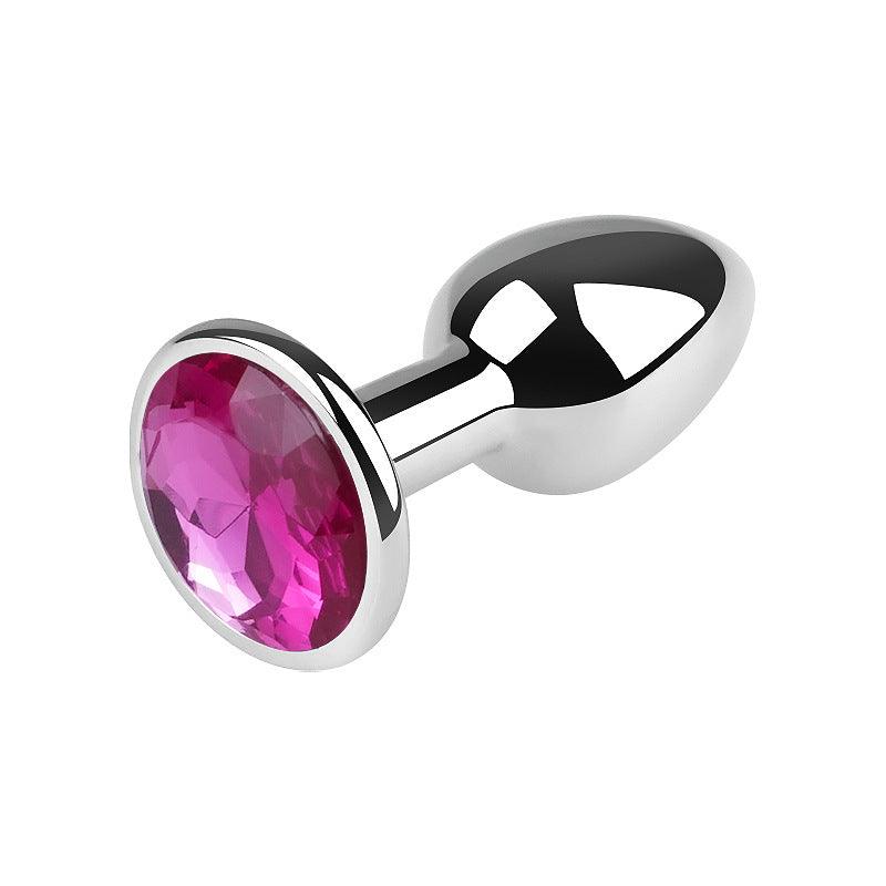 Silver metal butt plug with pink gem, 2.5 inches