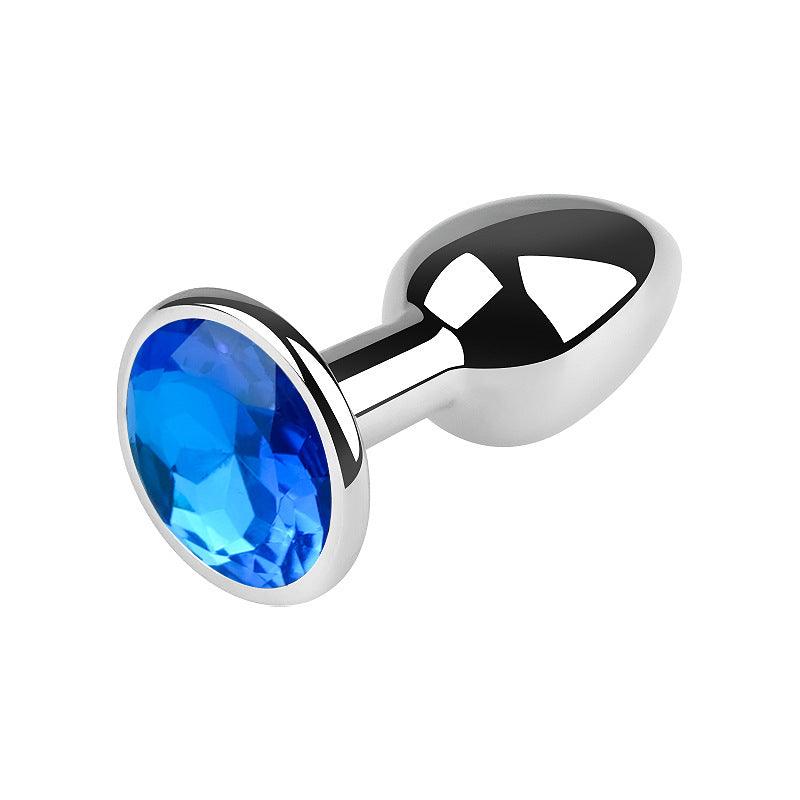 Silver metal butt plug with blue gem, 2.5 inches