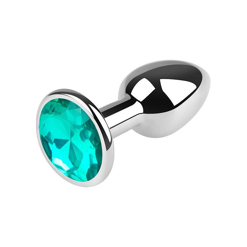 Silver metal butt plug with teal gem, 2.5 inches