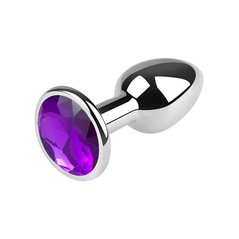 Silver metal butt plug with purple gem, 2.5 inches